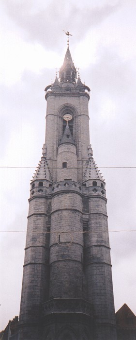 The beautiful blueish stone construction of the belfry, the oldest in Belgium