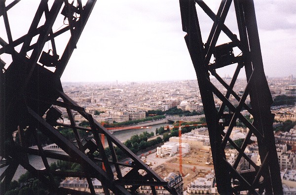 view of Paris and the Seine from the steps of the Eiffel Tower